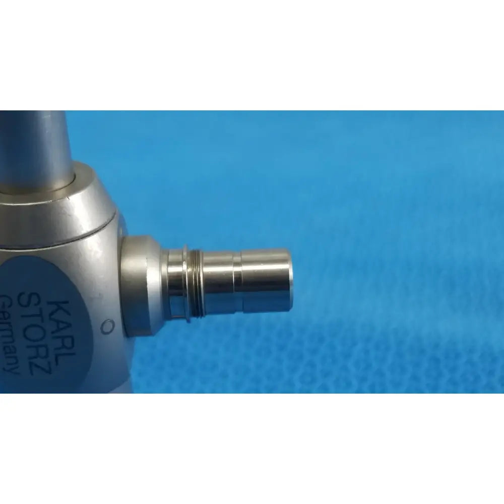 Silver metallic autoclavable laparoscope with cylindrical body and threaded connection branded karl storz hopkins germany
