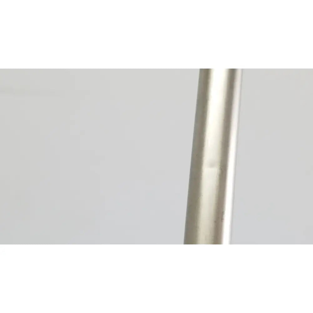 A sleek metallic silver cylindrical karl storz hopkins ii 0° laparoscope with a smooth reflective surface