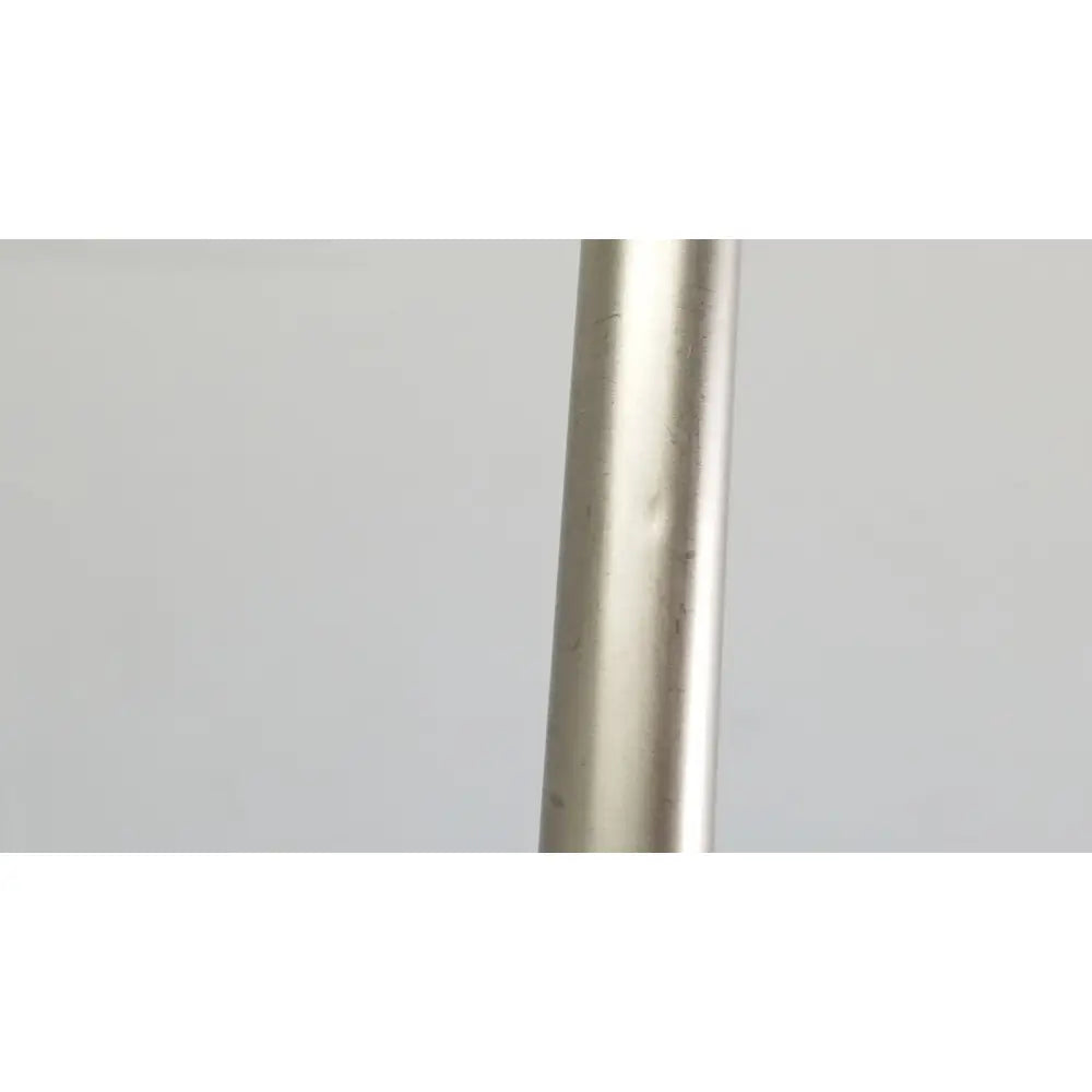A sleek metallic cylindrical handle with brushed silver finish and subtle imperfections on the karl storz hopkins ii 26003 aa laparoscope