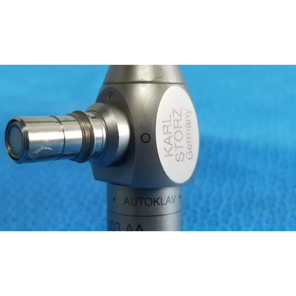 Silver metallic cylindrical autoclave laparoscope endoscope by karl storz hopkins with threaded connector and german label