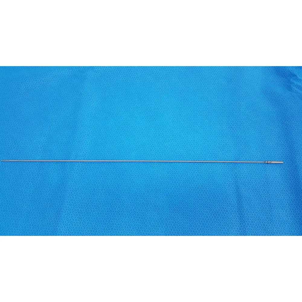 A slender metallic karl storz laparoscopic grasper model 33410 dyd with a smooth reflective surface and small threaded tip