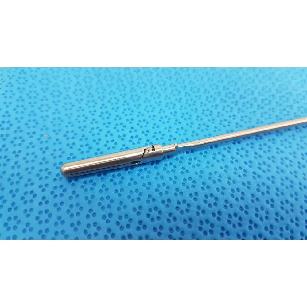 Silver karl storz laparoscopic grasper model 33410 dyd with sleek cylindrical shaft and textured grip section