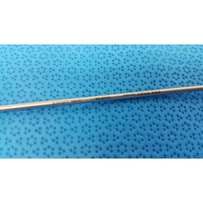 A metallic karl storz laparoscopic grasper electrode with engraved markings and sleek silver finish model 33410ml