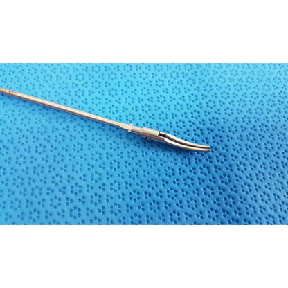 Silver karl storz laparoscopic grasper model 33410ml with long slender shaft and curved serrated jaws