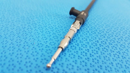 Black and silver karl storz laparoscopic sheath model 33400 with textured grip and threaded metallic shaft