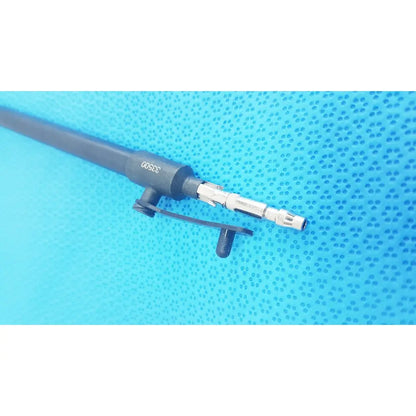 Black and silver karl storz laparoscopic surgical instrument with textured grip labeled 30500 near the handle model 33500