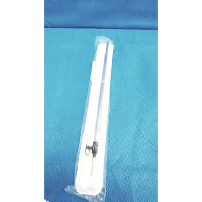 A sterile white plastic wrapped karl storz ref 33500m clickline metalouter tube with black mechanical part and metal tip