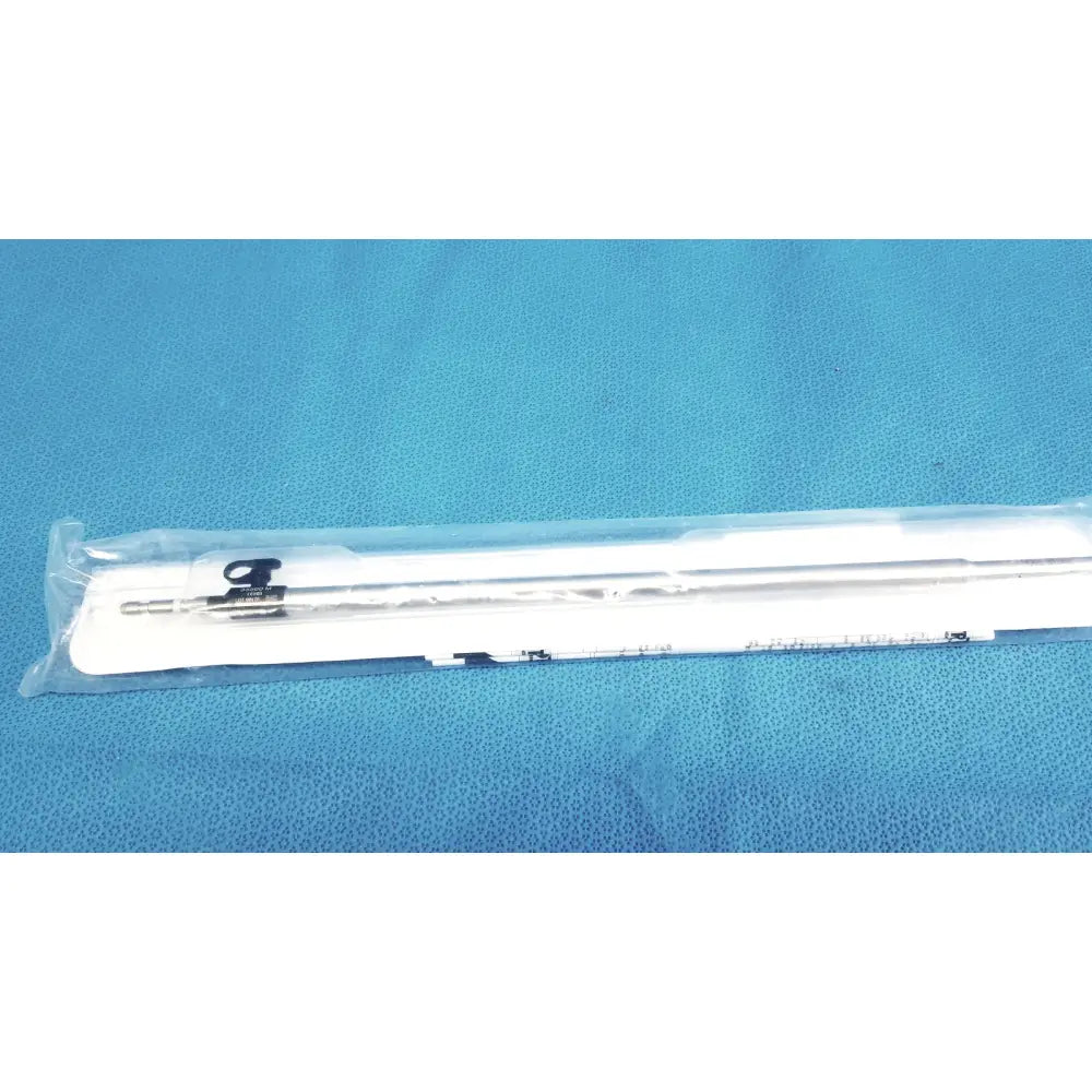 Sterile white medical catheter with black connector and metallic tip packaged in clear plastic karl storz ref 33500m clickline