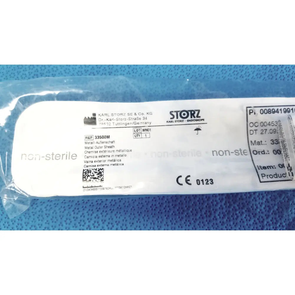 White plastic-wrapped karl storz ref 33500m clickline metal outer tube with black printed labeling and brand name storz