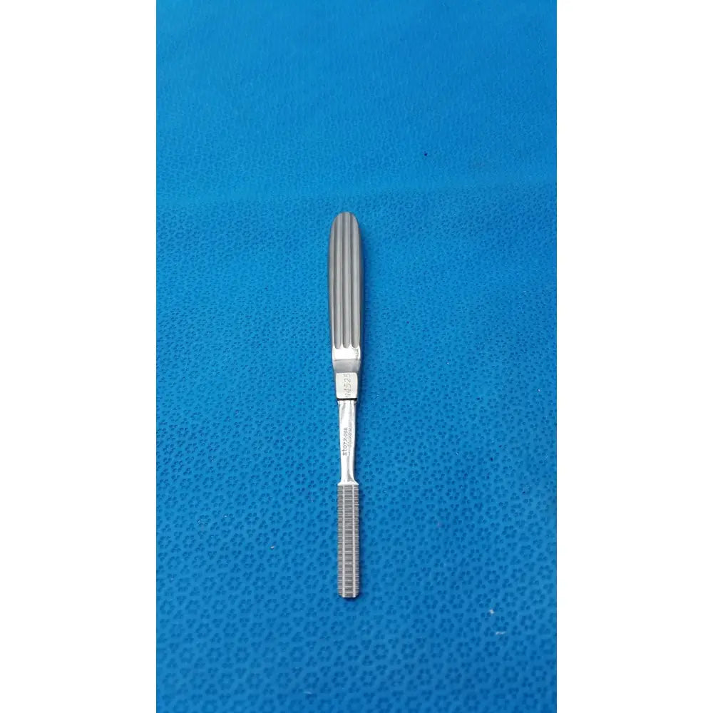 Silver karl storz stainless steel n4525 surgical instrument with ribbed tapered handle and textured grip