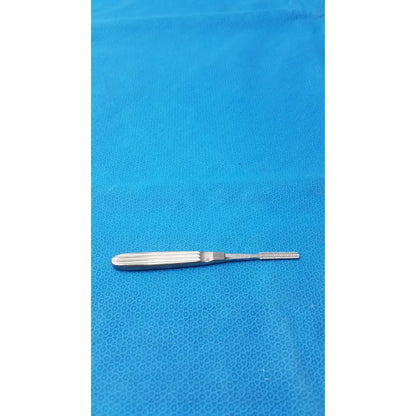 Silver karl storz stainless steel n4525 surgical instrument with textured grip and fine serrated tip for precision use