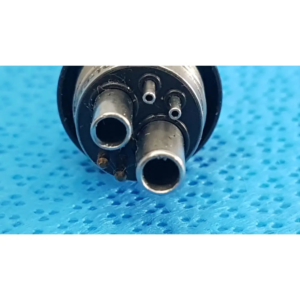 Black and silver surgical pin 460led coupler with three metallic ports for dental handpiece connector use