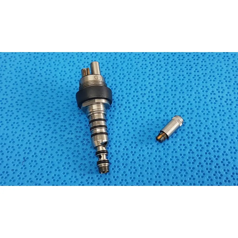 Silver metallic KAVO pin 460led coupler dental handpiece connector with black seal and matching cylindrical attachment