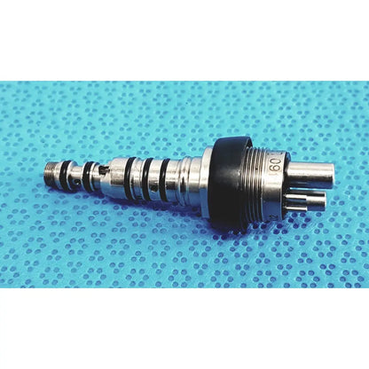 Silver metallic kavO 460 LED multiflex lux dental handpiece with black rubber seals and threaded coupling components