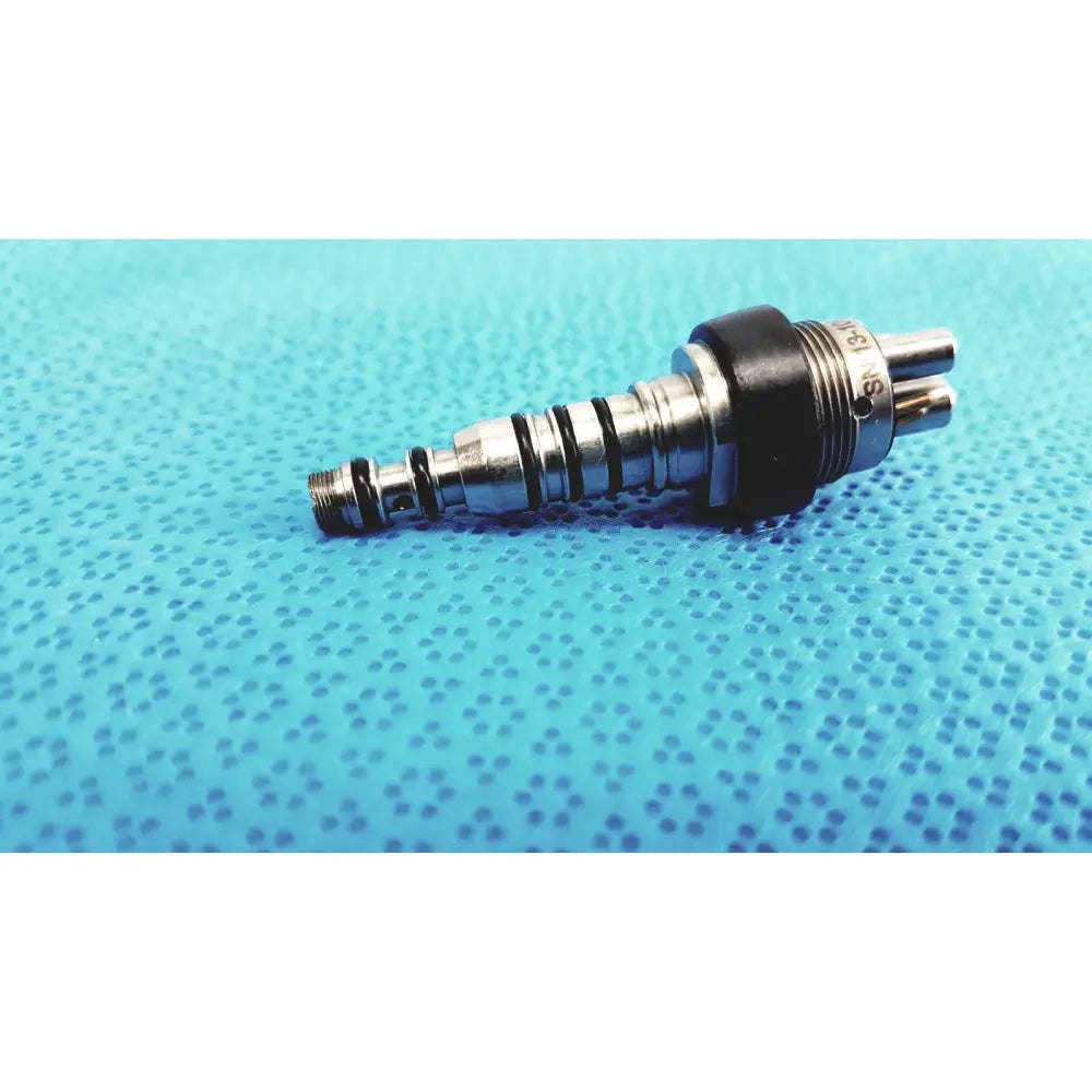 Black and silver led multiflex lux 6-pin coupler with threaded metal body and rubberized grip for dental handpiece connection