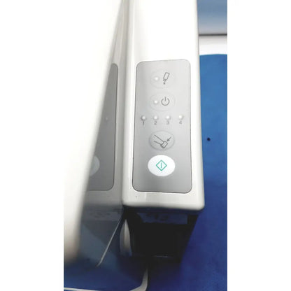 White control panel with silver buttons for power, settings, and cleaning on kavo quattrocare plus handpiece system