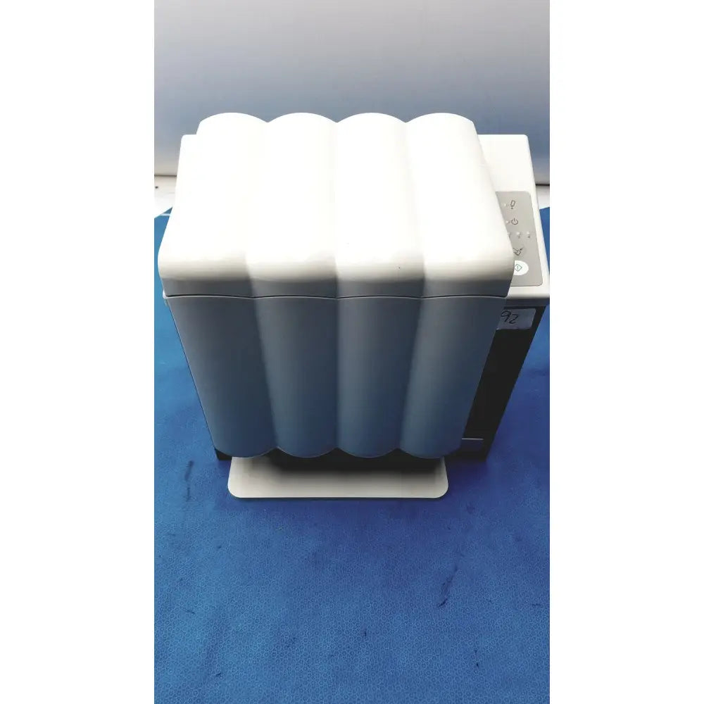 White and gray wave-patterned printer with sleek modern design in kavo quattrocare plus 2124 a handpiece maintenance system