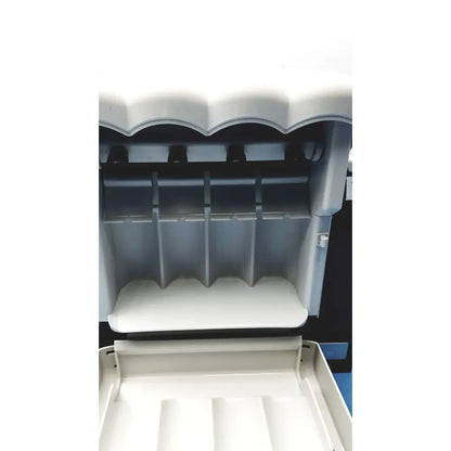 White plastic ice cream machine with scalloped lid and compartments in kavo quattrocare plus handpiece maintenance system