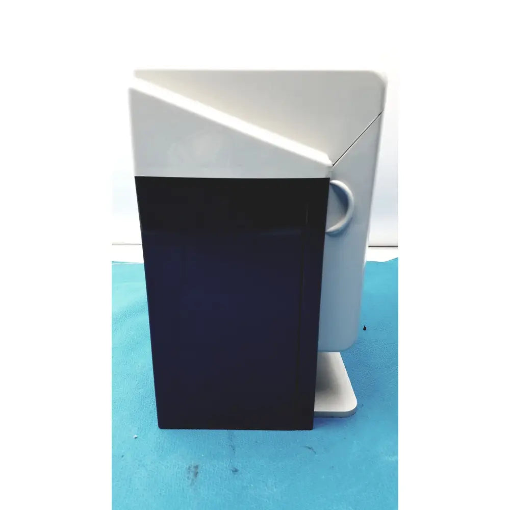 White and black two-tone plastic dental handpiece maintenance system with circular side handle kavo quattrocare plus 2124a