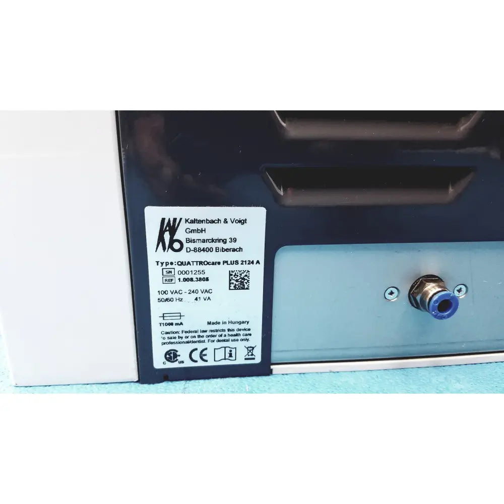 Black and light blue kavo quattrocare plus 2124a medical handpiece maintenance system by kaltenbach & voigt gmbh
