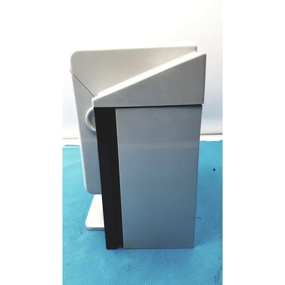 Gray plastic podium with black vertical strip and white base for kavo quattrocare plus 2124a handpiece maintenance system