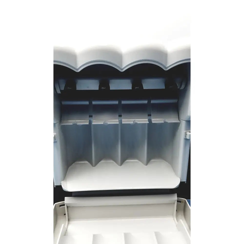 White plastic ice machine with scalloped top and multiple compartments for ice in kavo quattrocare plus 2124a system