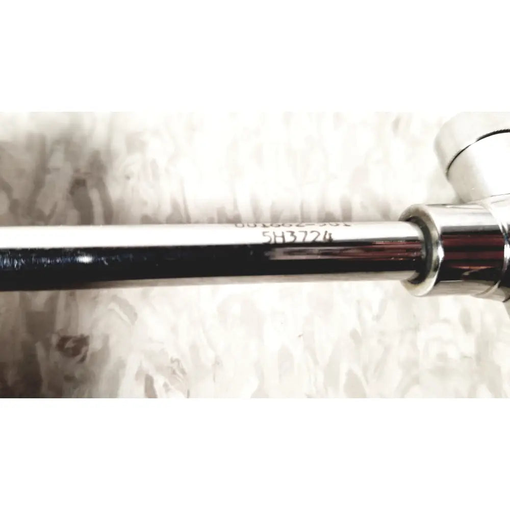 Chrome-finished reusable metal trocar sleeve kli 001662-501 with engraved serial number markings on metal wrench