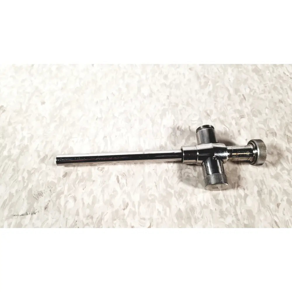 Shiny chrome-plated reusable metal trocar sleeve with long handle and three threaded knobs for surgical use