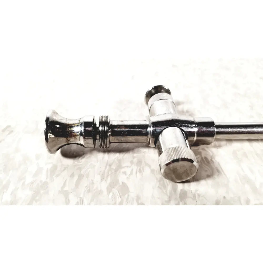 Shiny chrome-plated reusable metal trocar sleeve kli 001662-501 with cross-shaped handle and threaded joints