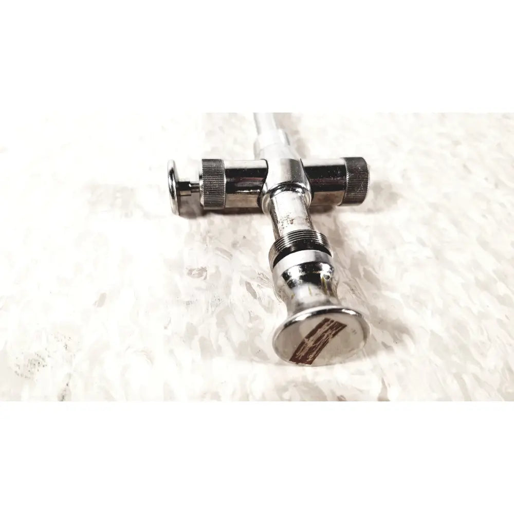 Chrome-finished t-shaped reusable metal trocar sleeve valve with threaded connections and knurled adjustment knobs