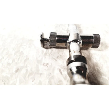 Shiny chrome reusable metal trocar sleeve kli 001662-501 with t-shaped design and textured knobs