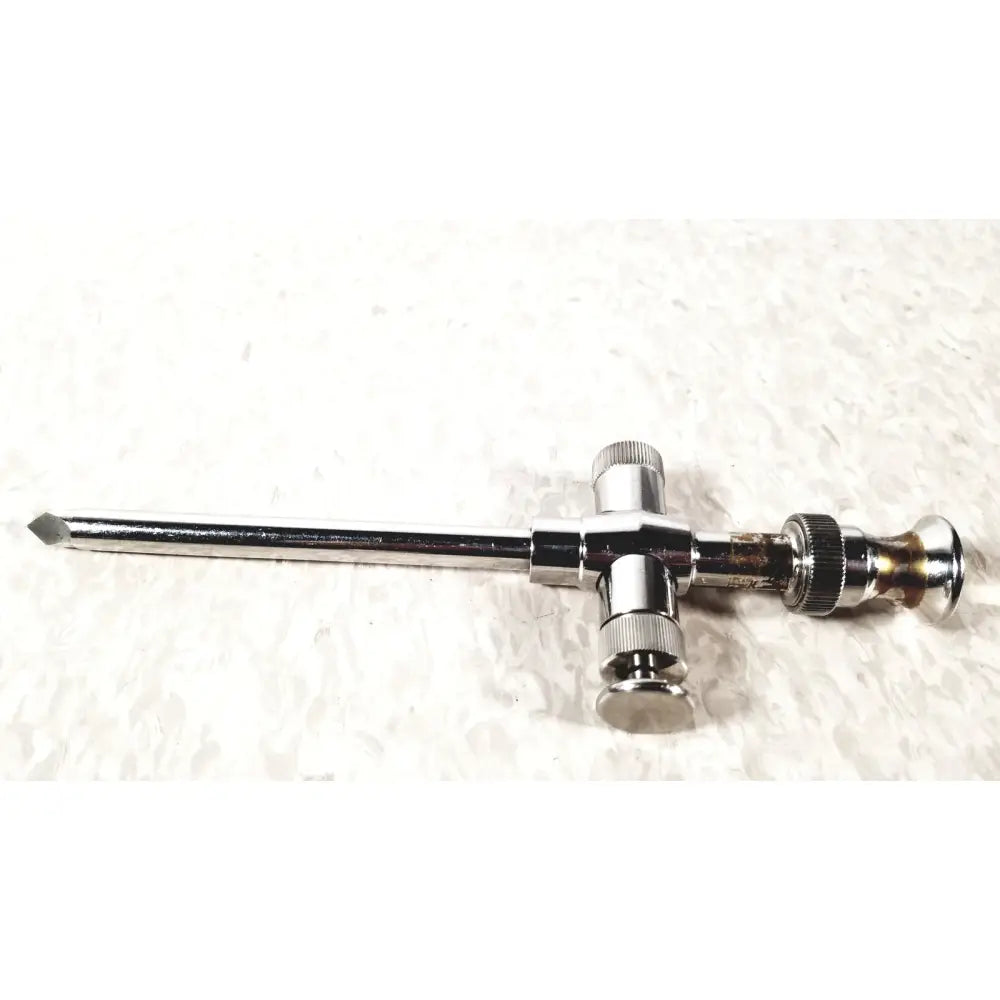 Chrome-finished reusable metal trocar sleeve kli 001662-501 with cross-shaped handle and threaded knobs in metal trocar design