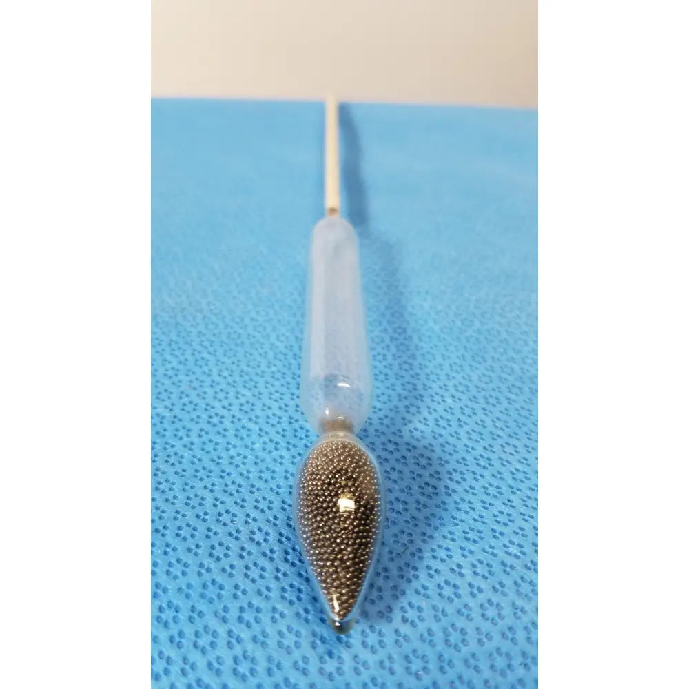 A clear glass specific gravity hydrometer with a silver metallic tip filled with beads for heavy light liquids temp 60°/60°F