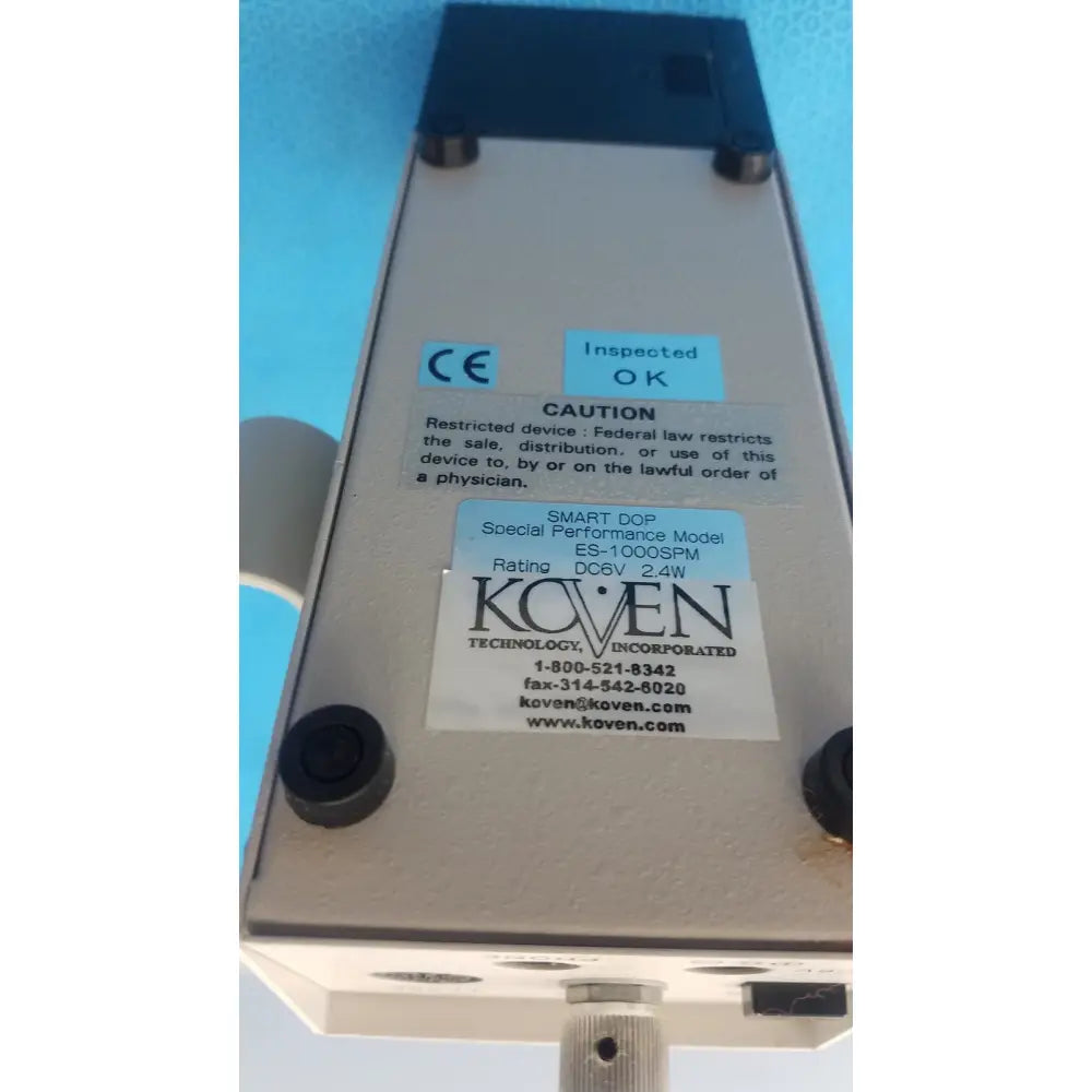 Silver metallic koven wave hadeco es-1000spm medical device with black plastic corners and mounting hardware