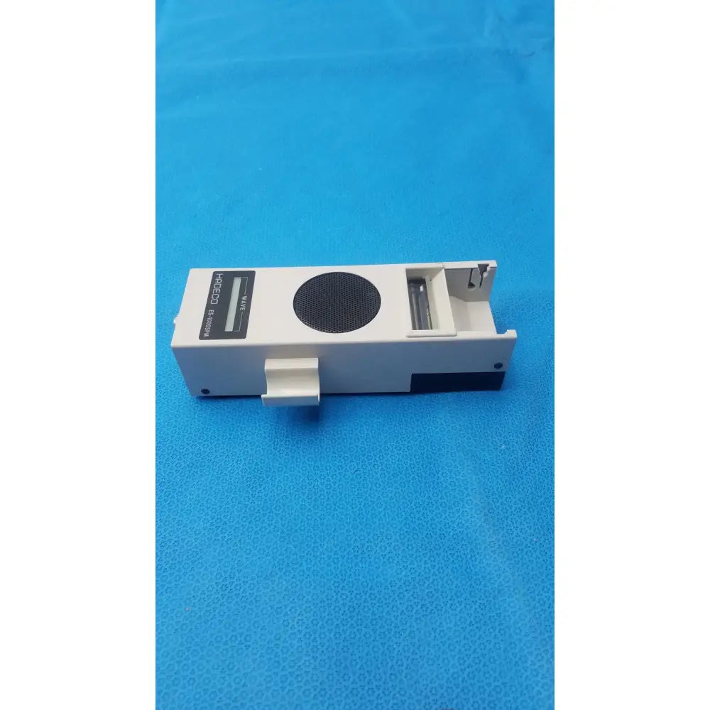 White rectangular koven wave hadeco electronic device with black circular grille model 80-dc300h for wave hadeco moel es-1000spm