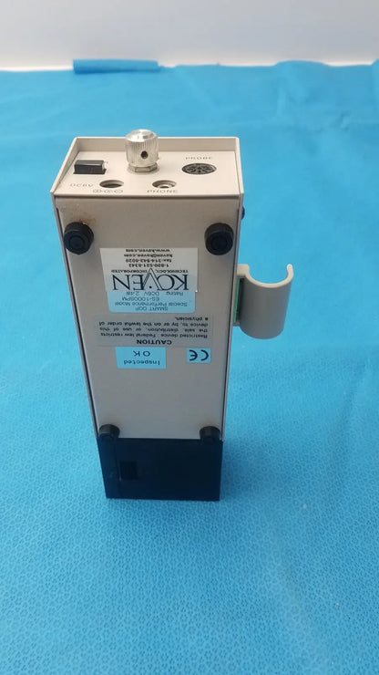 Beige and black koven wave hadeco industrial sensor unit with silver adjustment knob labeled koven on front panel