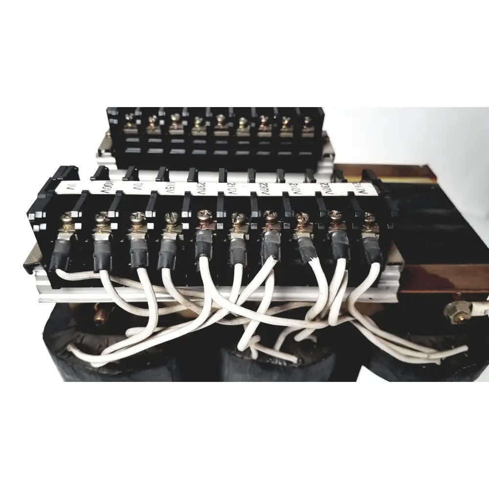 Black electrical terminal block with silver connectors and white wires for kowa sangyo power transformers reuse medical applications