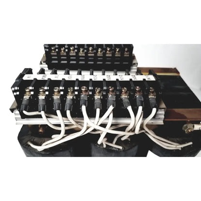 Black electrical terminal block with silver connectors and white wires for kowa sangyo power transformers reuse medical applications