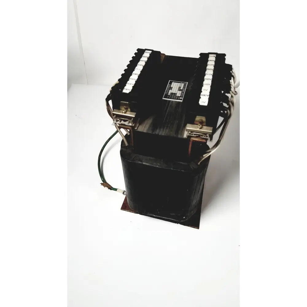Black industrial power transformer with copper windings and terminal blocks by kowa sangyo for reuse medical applications