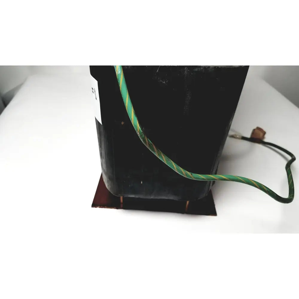 Black rectangular power transformer by kowa sangyo with green and yellow striped wiring for reuse medical power transformers
