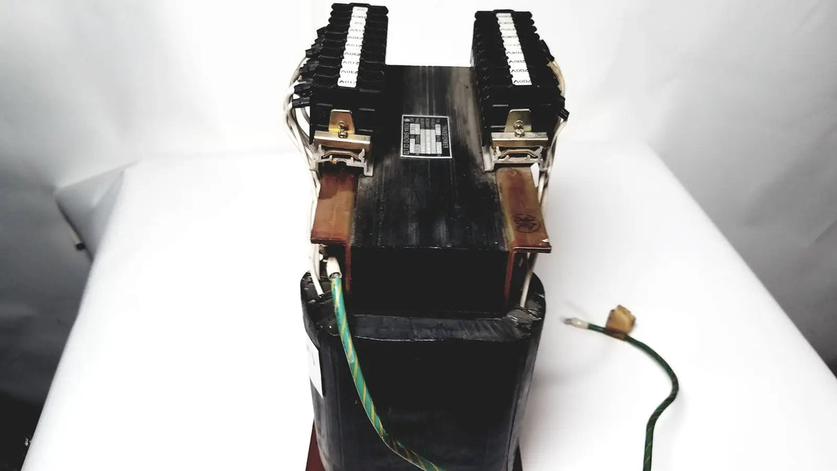 Black industrial power transformer by kowa sangyo with dual terminal blocks and copper-colored clamps for reuse medical use