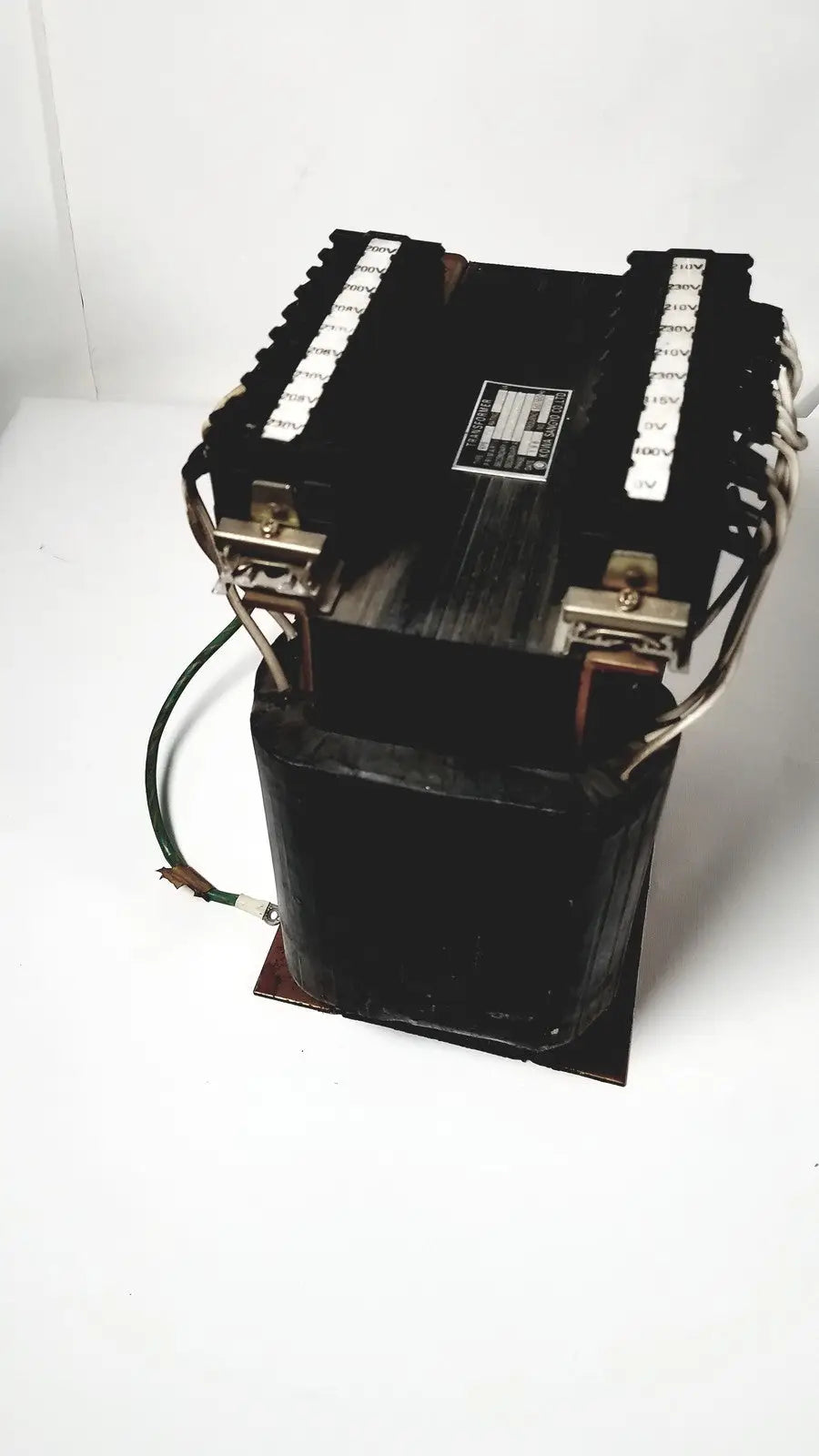 Black industrial power transformer with copper windings and terminal blocks by kowa sangyo for reuse medical applications