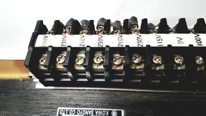 Black plastic terminal block with gold screws and white voltage labels 230v 15v 0v on kowa sangyo power transformer