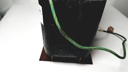 Black rectangular power transformer by kowa sangyo with green and yellow striped wiring for reuse medical power transformers