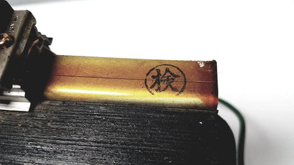 Golden metallic kowa sangyo co ltd transformer with circular stamp featuring chinese character檢 for power transformers reuse medical use
