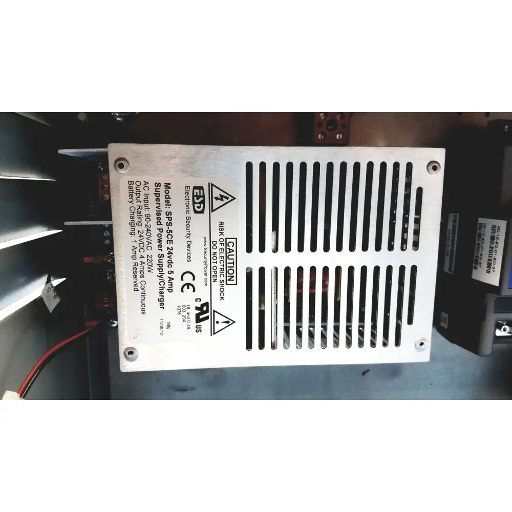 Silver metal power supply unit with vertical slotted ventilation and printed specifications for kryptonite cmt22a access control