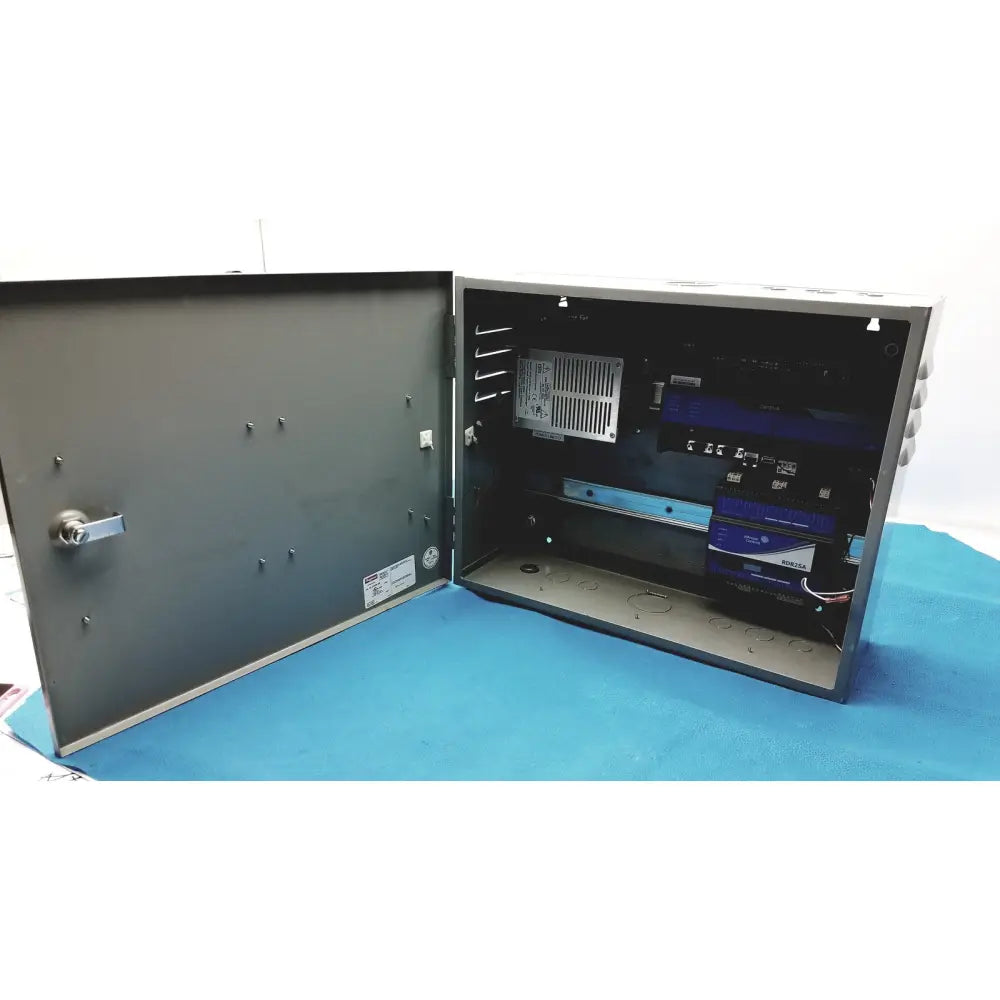 Gray metal electrical enclosure with hinged door and visible internal components for kryptonite cmt22a access control system