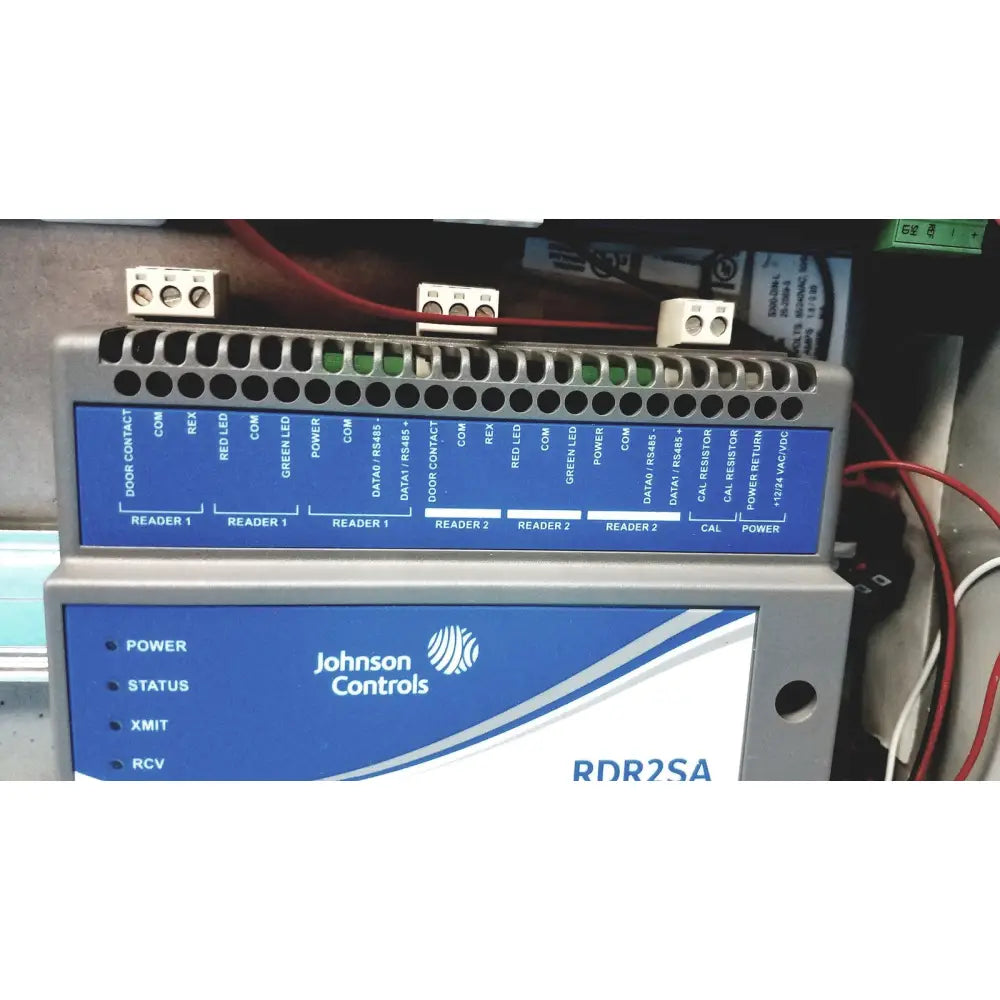 Gray and blue industrial control panel labeled johnson controls rdr2sa with ports and lights for kryptonite cmt22a access control