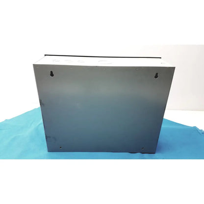 Gray metal electrical junction box with mounting holes and circular cutouts for kryptonite cmt22a access control system