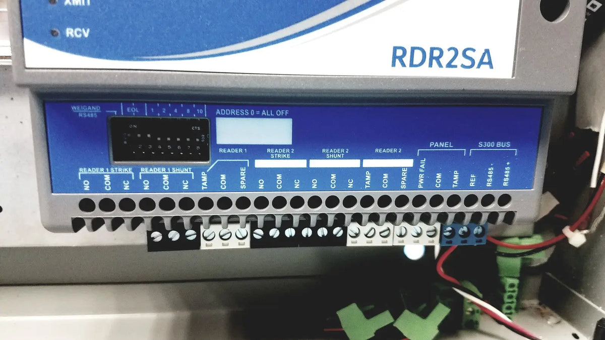 Gray and blue industrial control panel labeled rdr2sa with digital display and wiring for kryptonite cmt22a access control system